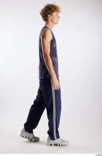 Urien  1 blue tank top blue track pants dressed…